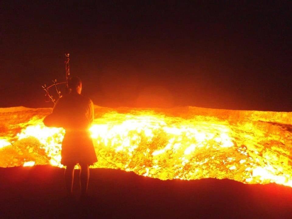 Playing the bagpipes by the Gates to Hell. Photo: Anthony Coupland