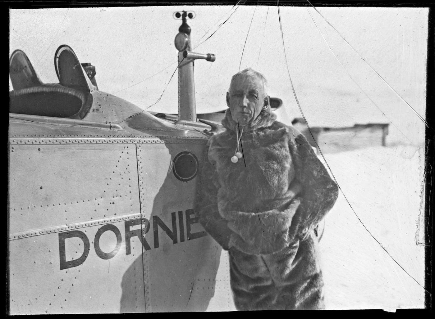 Roald Amundsen next to his plane for his 1925 flight to the North Pole. But it was not his first time planning a flight over the Arctic. 